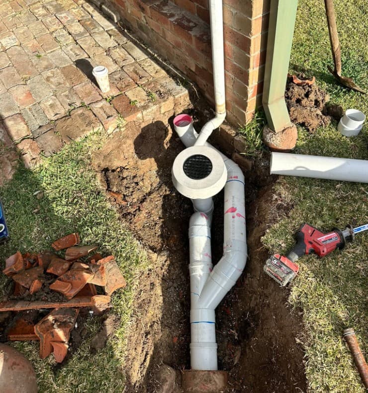 New PVC drainage pipework freshly installed during a residential drainage upgrade in Kiama